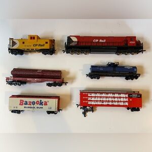 CP Rail and Bazooka Tyco Toy Train Set selling as a lot